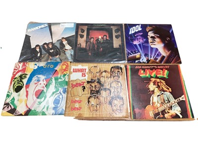 Lot 2211 - Two boxes of LP records, including Saxon, U2, AC/DC, Rainbow, Pretenders, UFO, Moody Blue, Ramones, Stranglers, Scorpions, Dire Straits and Ian Dury - some 12" singles included, conditions vary