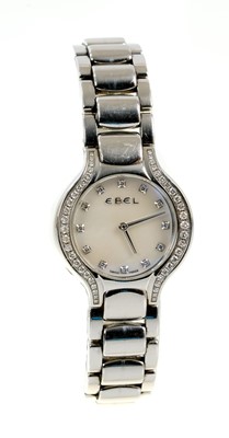 Lot 736 - Ladies Ebel Beluga stainless steel and diamond wristwatch with mother of pearl dial and diamond dot hour markers and diamond-set bezel in stainless steel case on stainless steel bracelet. With extr...