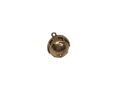 Lot 140 - Masonic ball pendant, the metamorphic ball opening to reveal a cross with engraved Masonic devises, stamped 'SIL 9CT'