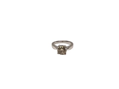 Lot 142 - Diamond single stone ring with a brilliant cut diamond estimated to weigh approximately 1.20cts, in four claw setting on 18ct white gold shank.