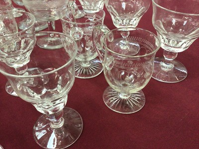 Lot 40 - A group of Victorian and later glassware, including a set of nine Edwardian etched custard cups, a set of six Victorian vine-etched sherry glasses, a pair of engraved coupes, a group of eight Stuar...