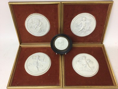 Lot 980 - Victorian parian ware relief plaque together with a set of four plaster roundels