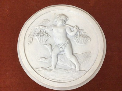 Lot 980 - Victorian parian ware relief plaque together with a set of four plaster roundels