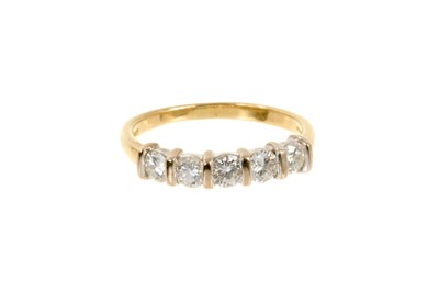 Lot 539 - Diamond half eternity ring with a five brilliant cut diamonds in 18ct gold setting