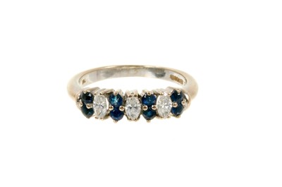 Lot 538 - Sapphire and diamond half eternity ring with three marquise cut diamonds interspaced by pairs of round mixed cut blue sapphires in 18ct white gold setting