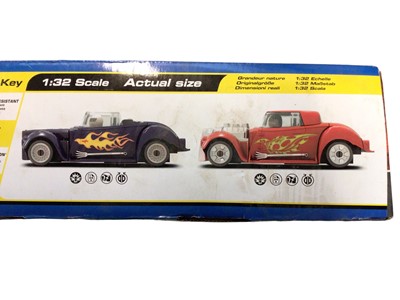 Lot 1933 - Scalextric 1:32 Scale Quick Build Demolition Derby with Metal Alien v White Skull, box sealed (torn near handle) (1)