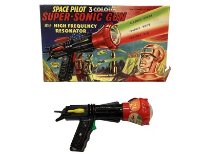 Lot 1875 - Space pilot super sonic gun boxed, plus other space items boxed and unboxed