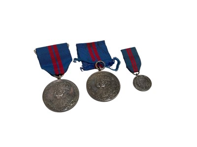 Lot 789 - Two George V 1911 Coronation medals, together with a miniature (3).