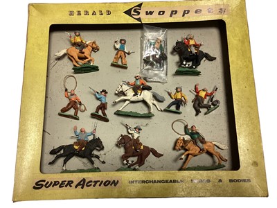 Lot 1946 - Herald Swoppets Super Action Cowboys 6 mounted & 6 foot, with original box (No window & in worn condition (11 cowboys still attached) (1)