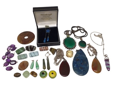 Lot 21 - Semi-precious stone pendants, some on chains and other loose gem stones