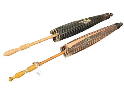 Lot 453 - Near pair of Japanese parasols