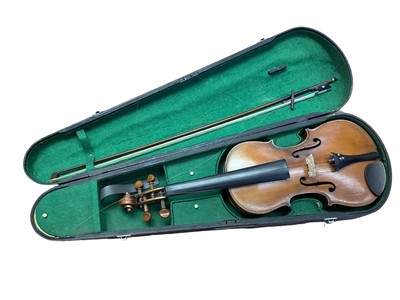 Lot 2263 - Late 19th century violin bearing Stradivarius label, together with a bow in case