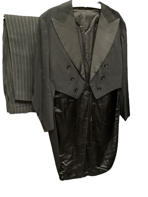 Lot 2111 - 1932 mens tailcoat plus accessories including evening scarves, white collars, pair of wooden shoe trees, Tootal dressing gown in original packaging and Henry Banerman pyjamas, new.