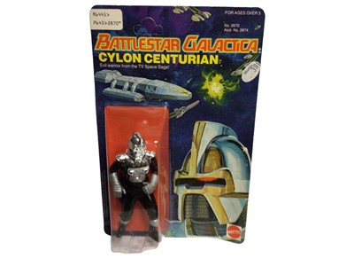 Lot 404 - Mattel 1978 Battlestar Galactica Cylon Centurian 4" action figure with cylon laser rifle, on Series 1 card and blister pack No.2870 (1)