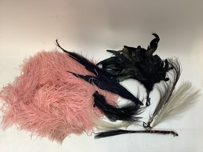 Lot 2114 - Quantity of ostrich feathers including pink and black, white and cream single feathers.  Also a selection of milliners bird feathers and plumes