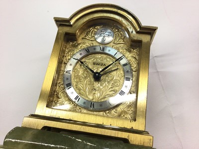 Lot 1001 - Chinese silver/white metal rickshaws, rowing boat etc, three silver napkin rings, plated ware and a bedside clock