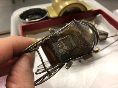 Lot 1001 - Chinese silver/white metal rickshaws, rowing boat etc, three silver napkin rings, plated ware and a bedside clock