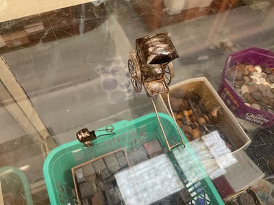 Lot 1001 - Chinese silver/white metal rickshaws, rowing boat etc, three silver napkin rings, plated ware and a bedside clock