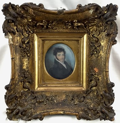 Lot 10 - Early 19th century portrait miniature of a Gentleman, on ivory, in deep gilt frame