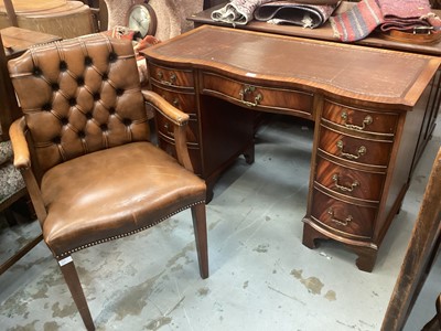 Lot 1219 - Edwardian-style mahogany serpentine fronted twin pedestal desk, together with a leather studded deskchair