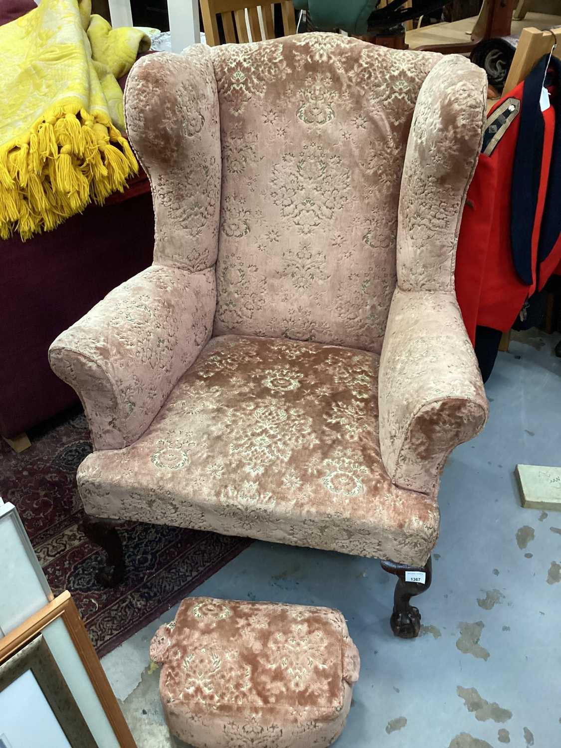 Lot 1367 - Traditional Wing armchair on claw and ball feet