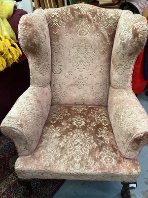 Lot 1367 - Traditional Wing armchair on claw and ball feet