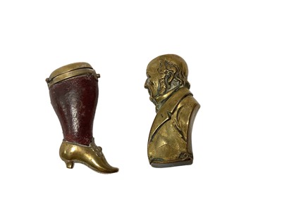 Lot 6 - Victorian brass novelty Vesta case in the form of a bust of William Gladstone 55mm high and another of a lady's leg 55mm (2)