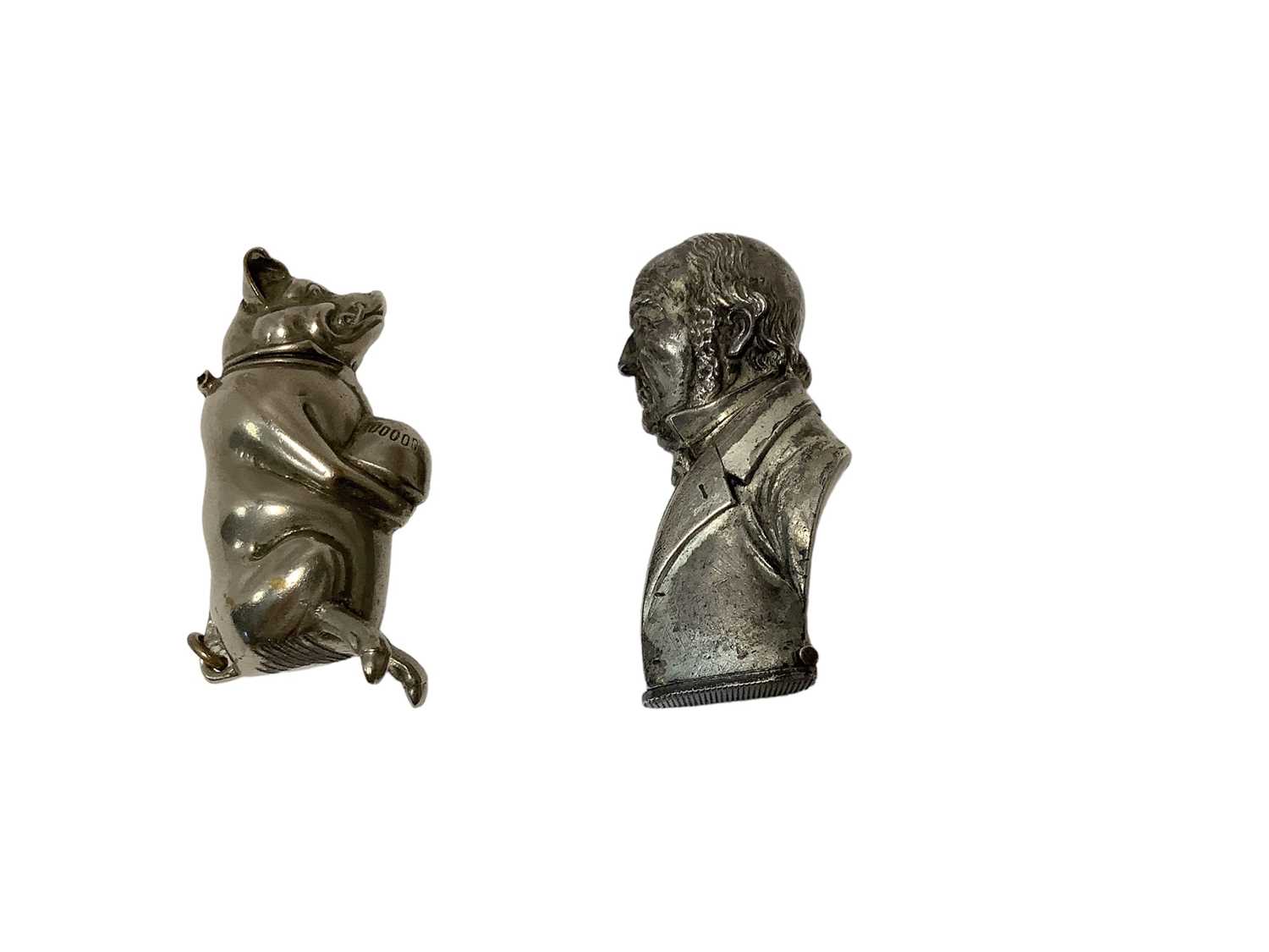 Lot 7 - Victorian plated novelty Vesta case in the form of a bust of William Gladstone 55mm high and another of a pig engraved 'Little'Wadhurst Farm' 5cm (2)