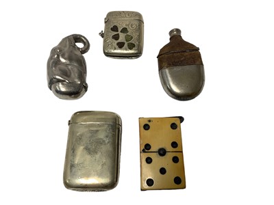 Lot 11 - Victorian novelty plated Vesta case in the form of an elephant head, another with inset bone dice and three other novelty Vesta cases (5)