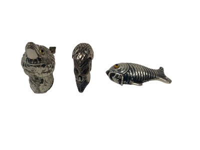 Lot 12 - Three modern novelty silver plated Vesta cases in the form of a demons head, a fish and a wolf's head (3)