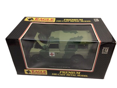 Lot 1993 - Eagle Collectables 1:18:Scale Premium diecast military Land Rover Serie III 109 soft top & Maisto Humber, both boxed, plus Battle Squads action figures (qty)