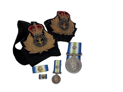 Lot 705 - South Atlantic medal with combat zone rosette named to 1/O G Ferguson RFA Tidepool, together with miniature medal, ribbons and two cap tallies.