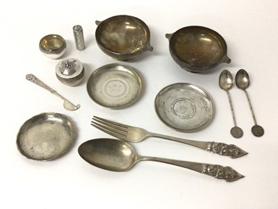 Lot 29 - A group of Eastern silver and white metal, including a pair of engraved Indian bowls, a salt and pepper, snuff bottle, knife, dish with inset 'Tientsin British Municipal Emergency Corps' medallion,...