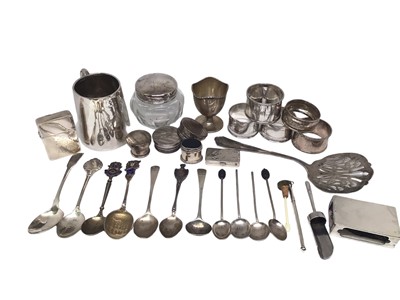 Lot 259 - Group of silver and white metal including a Christening mug, egg cup, various spoons, pill boxes, jar tops, Royal Artillery Ubique lighter, matchbox holder, napkin rings etc