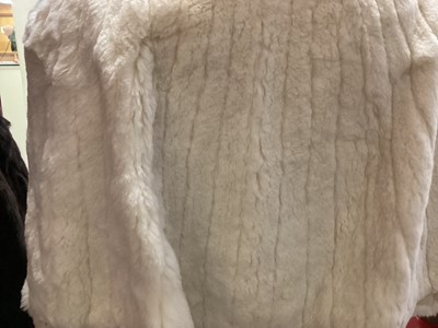 Lot 2122 - Cream mink jacket by Coles of Sheffield, white fur (probably ermine) capelet, 1970s Derry & Toms fitted mink coat and a red squirrel fur coat and mtching hat by Joseph Fox.  Plus a mink hats by De...
