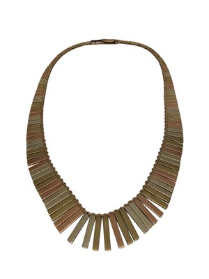 Lot 50 - 9ct three colour gold Cleopatra style fringe necklace