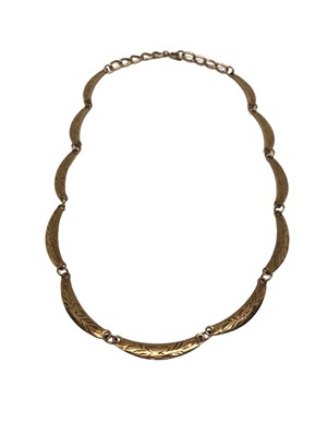 Lot 55 - 9ct gold curved panel link necklace with engraved decoration, 42cm long