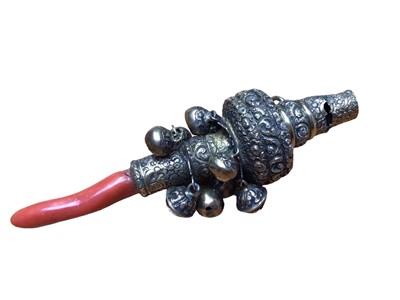 Lot 47 - Georgian silver gilt babies rattle with eleven suspended bells and a coral teether (makers mark MC)