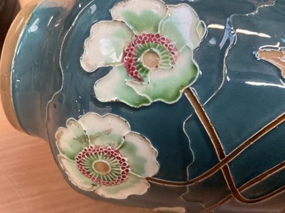 Lot 1220 - Pair of Eichwald Art Nouveau pottery vases with tube lined decoration of poppies