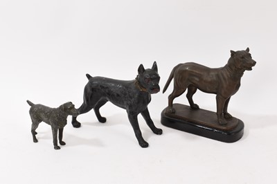 Lot 818 - Two antique metal models of dogs and another