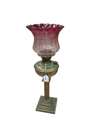 Lot 2400 - Victorian brass column oil lamp with etched cranberry glass shade