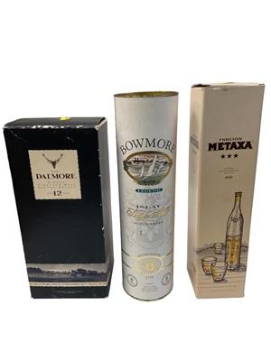 Lot 364 - Three bottles, Bowmore Legend, Islay Single Malt Whisky, 40%, 700ml, The Dalmore, 12 year old, 43%, 1 litre, together with a bottle of Metaxa, each boxed