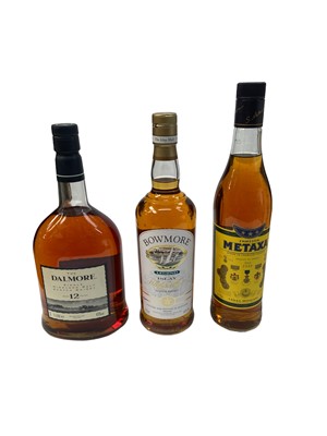 Lot 364 - Three bottles, Bowmore Legend, Islay Single Malt Whisky, 40%, 700ml, The Dalmore, 12 year old, 43%, 1 litre, together with a bottle of Metaxa, each boxed