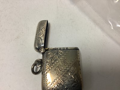 Lot 48 - Victorian silver Vesta case with floral scroll engraving and three others ( all silver ) (4)