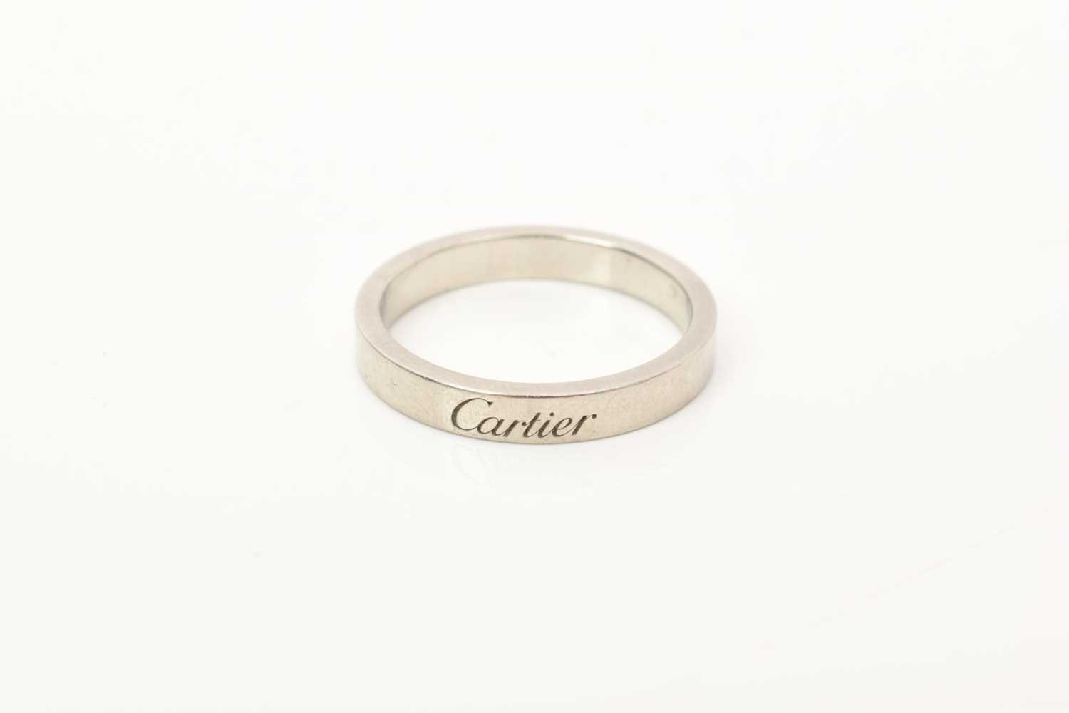 Lot 661 - Cartier platinum wedding ring