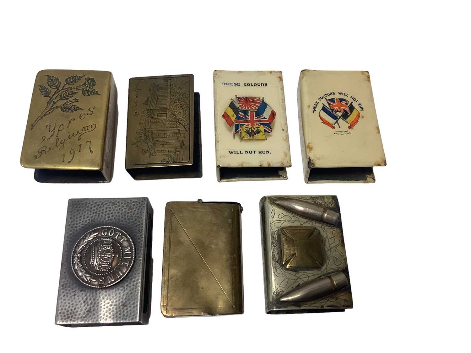 Lot 50 - Seven First World War Trench Art and other match box holders