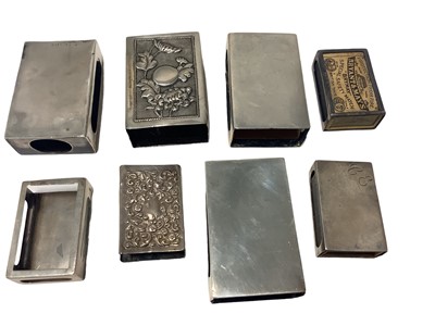 Lot 56 - Eight silver and Eastern white metal match box holders various (8)