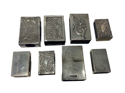 Lot 56 - Eight silver and Eastern white metal match box holders various (8)