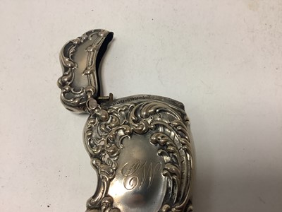 Lot 61 - Ornate late 19th century American  Sterling silver Vesta case with embossed rococo decoration 68 x 40 mm and another Sterling silver Vesta case (2)