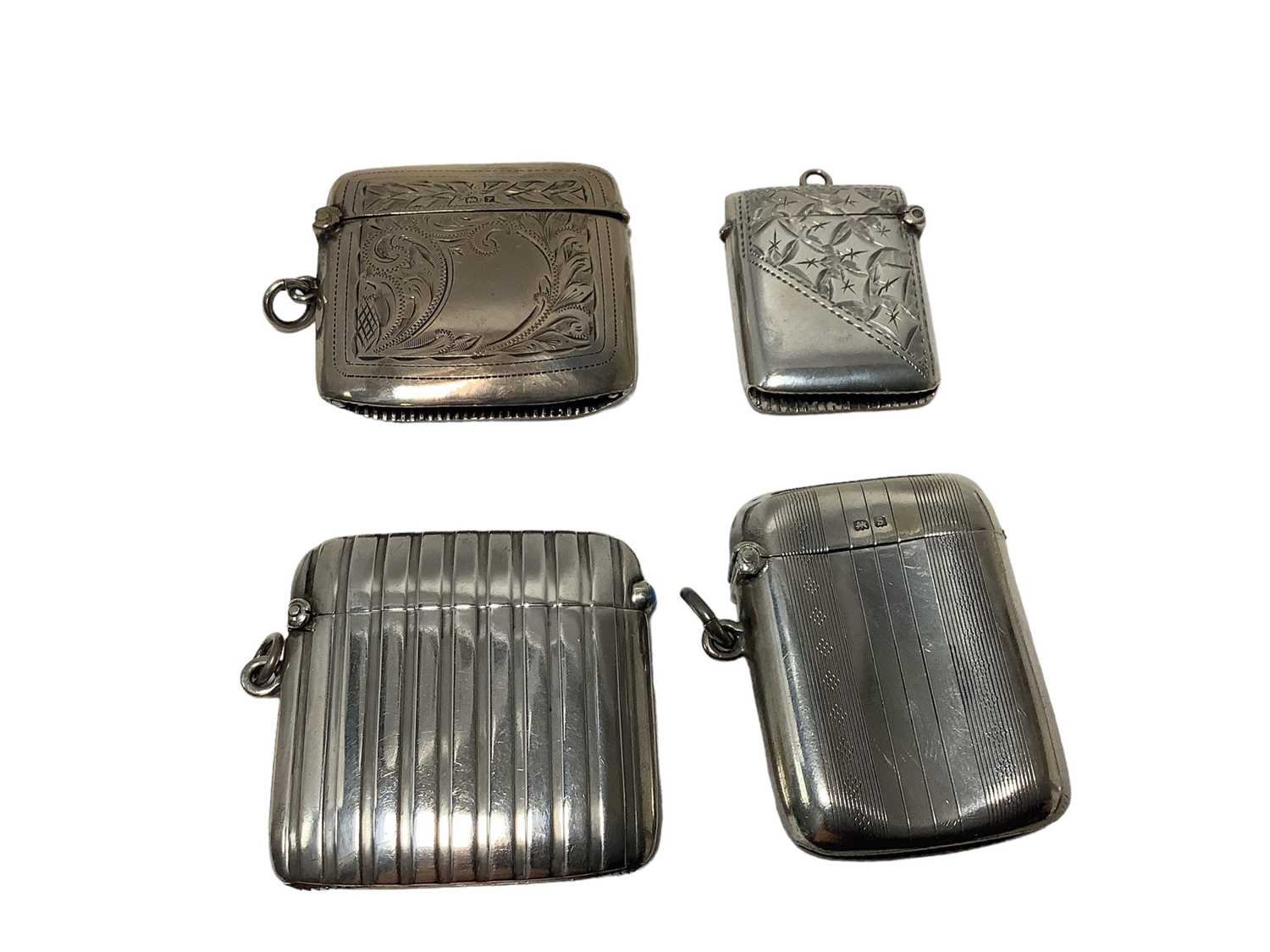 Lot 65 - Four Edwardian and later silver Vesta cases various (4)